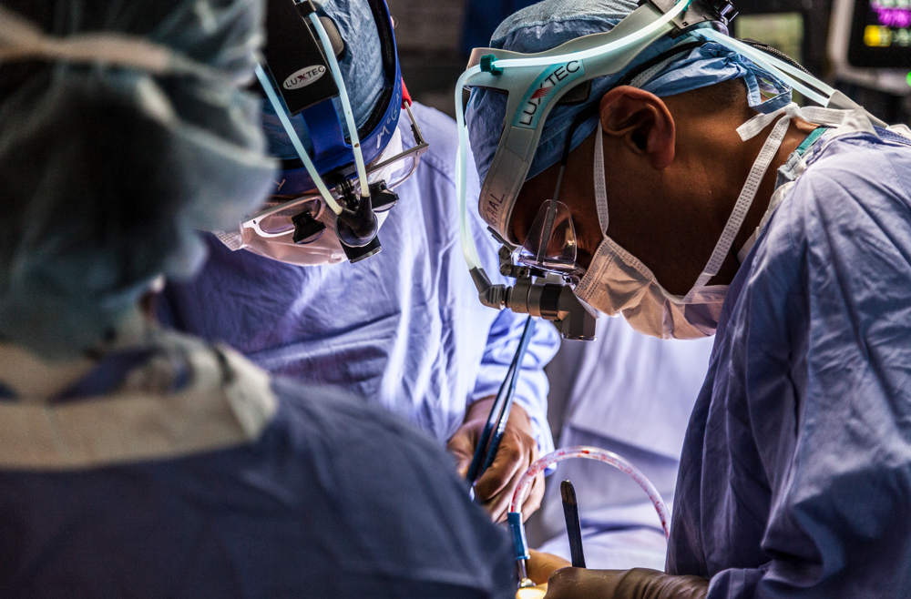 Sunil Singhal performing surgery with team
